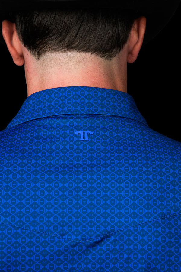 The Truett Pearl Snap Polo