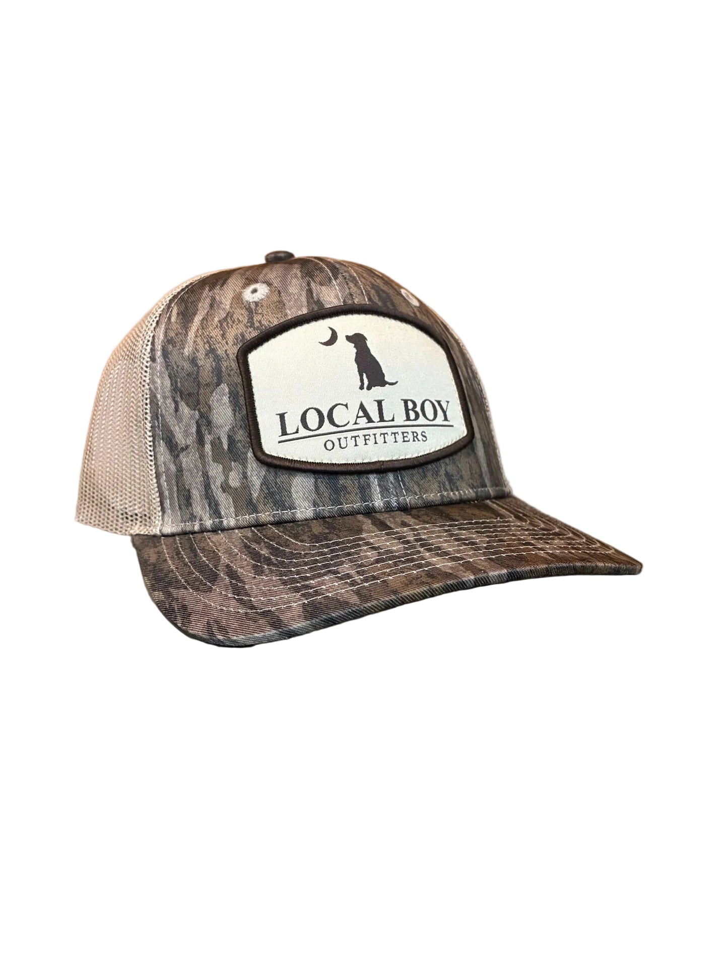 Pocket Badge Trucker Hat - Mossy Oak Bottomland